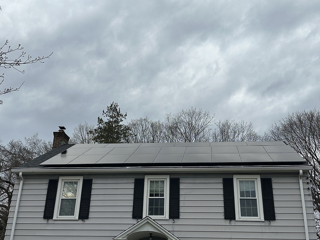 Solar panels on Cape Cod style home