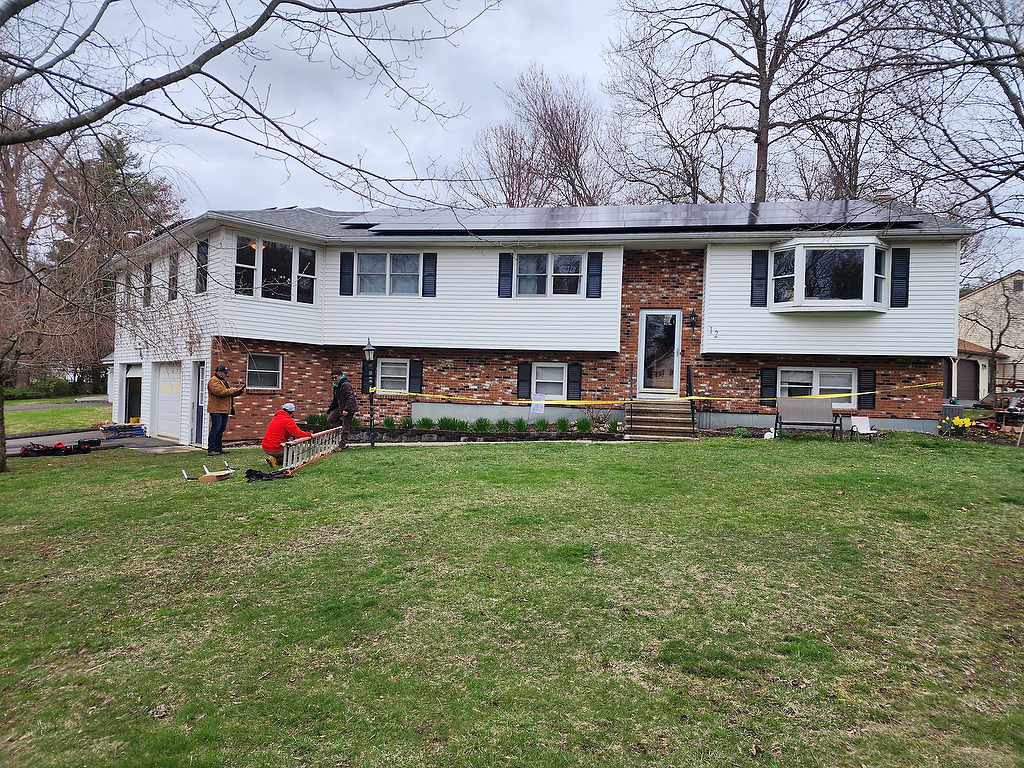 Solar installation on split-level brick home
